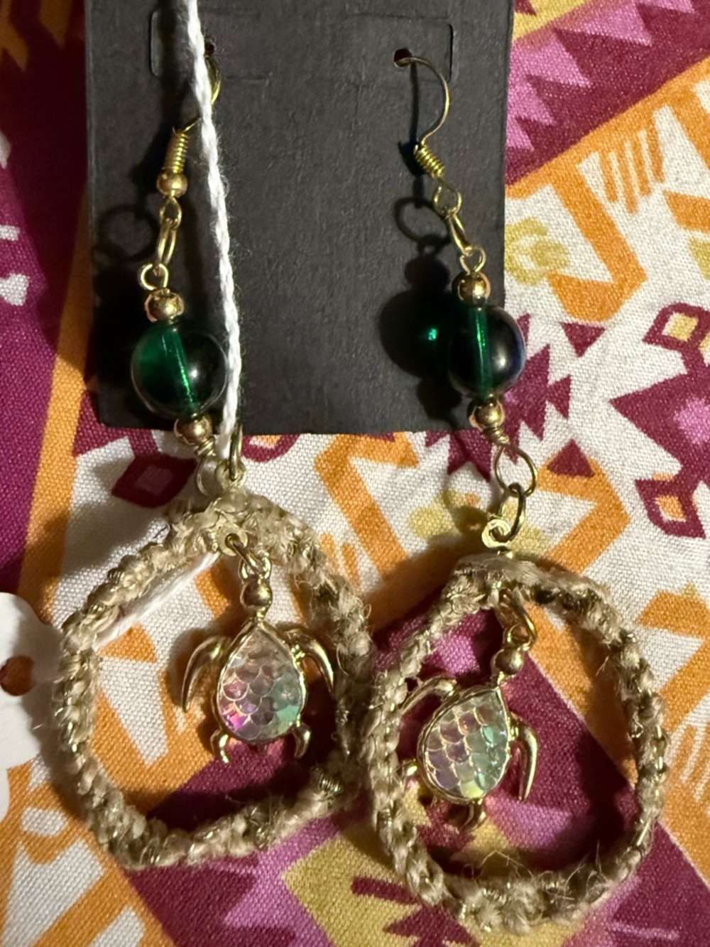 Gold-Tone Hoop Earrings with Green Bead and Iridescent Turtle Charm